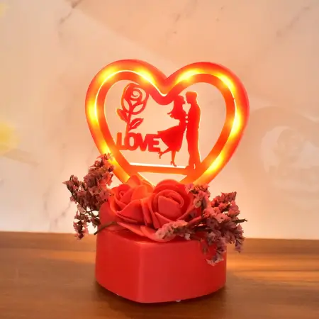 Romantic Heart-Shaped Love Couple Decorative Showpiece with Rose Base LED Light – Tabletop Gift for Home Decor, Anniversary, Valentine’s Day & Special Occasions (Battery Not Included) – 1 Pc